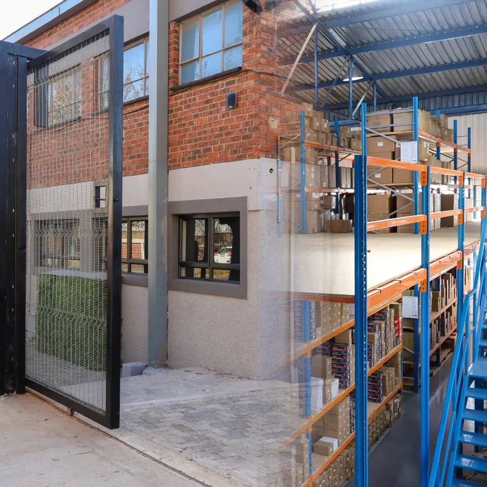 The entrance and the parts racking at Africar Spares Warehouse